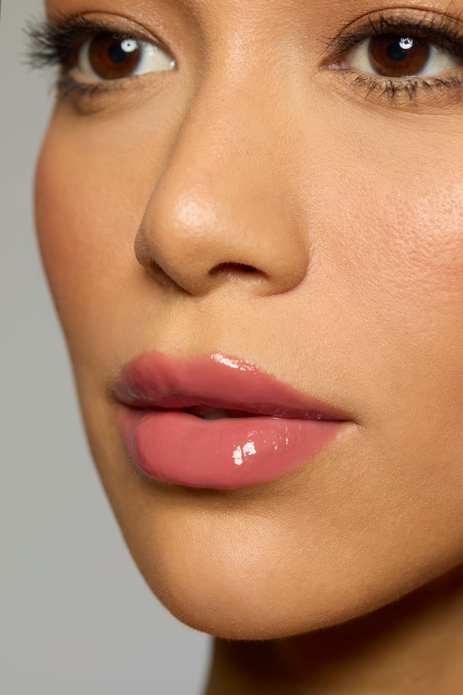 Lippie Gloss -Rose and Ash is a rich, velvety mauve that strikes the perfect balance between softness and depth. Elegant yet bold, this universally flattering shade enhances your natural beauty with effortless sophistication. Infused with our signature vanilla flavor, each application offers a subtle, indulgent touch that complements its smooth, hydrating formula. Glide it on for a soft, romantic flush or build it up for a deeper, statement look. Never sticky, always chic, Rose &amp; A